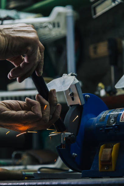 istock Close-up of workman working with iron 657650682