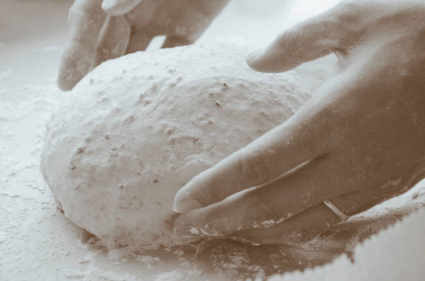 istock Kneading of the dough 657659176