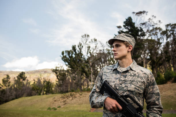 istock Military soldier guarding with a rifle 657659380