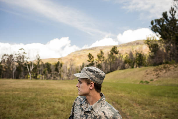 Young military soldier guarding in boot camp