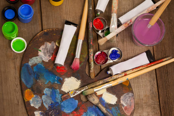 istock Palette with multiple colors, watercolor and paint brushes 657673008