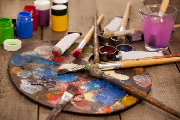 istock Palette with multiple colors, watercolor and paint brushes 657673022