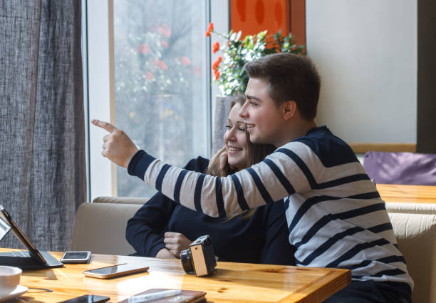istock Cheerful couple smiling with tablet 657675806