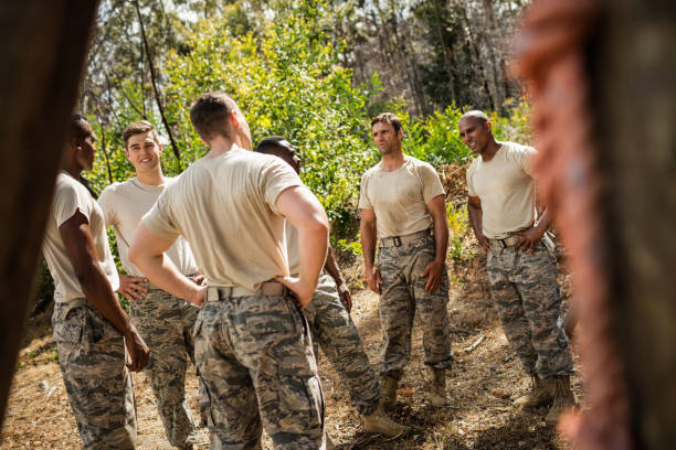 istock Military soldiers interacting with each other 657679294