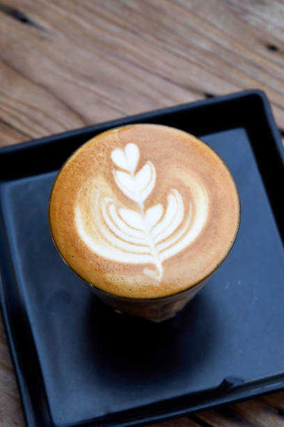 istock Coffee with heart shape latte art serve in glass 657681684