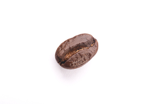 Grano de café en blanco photo