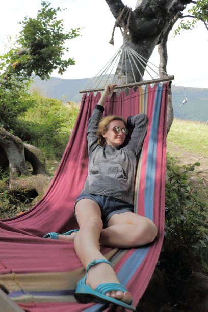 istock Woman in the hammock. 657687974