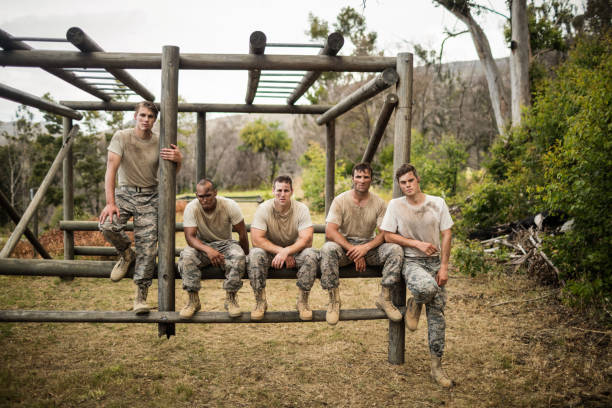 istock Soldiers sitting on the obstacle course in boot camp 657688628
