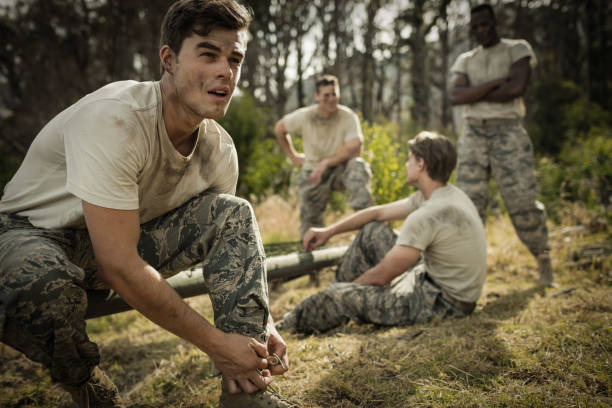 istock Soldier tying his shoe laces 657691544