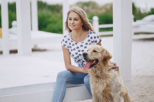istock couple walking outdoors with her dog 657708218