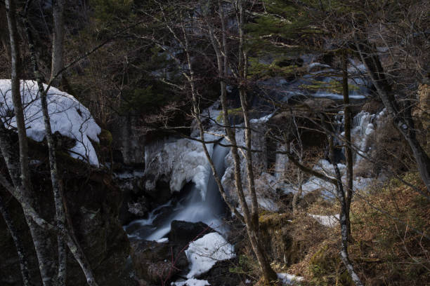 Parts of Ryuzu Waterfall with the remaining snow , Okunikko, Japan stock photo
