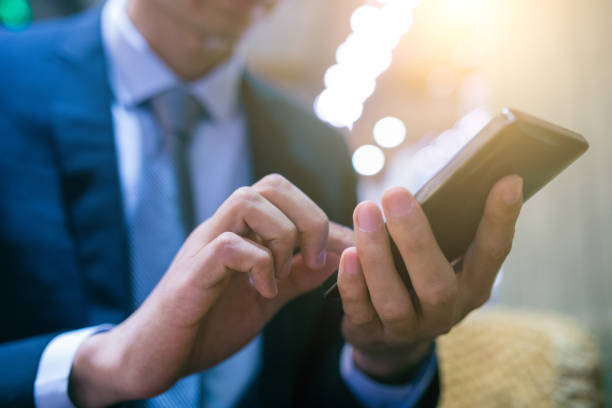 istock businessman typing message on mobile phone 657723874