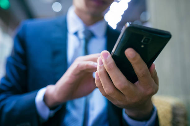 istock businessman typing message on mobile phone 657723880