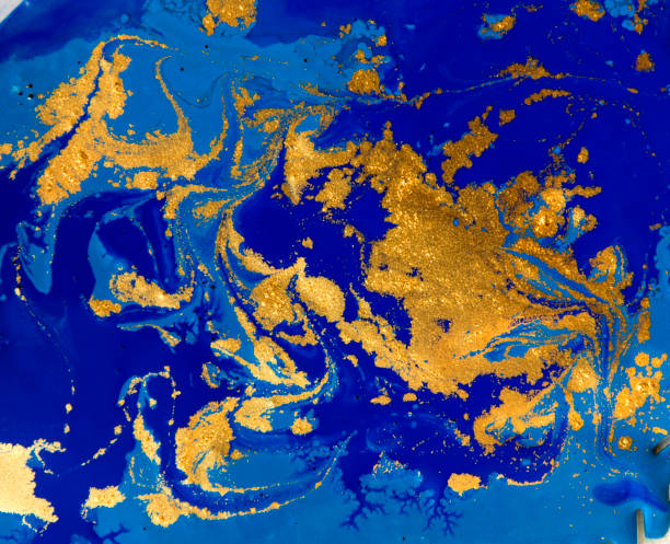 istock Blue and golden liquid texture, watercolor hand drawn marbling illustration, abstract background 657724184