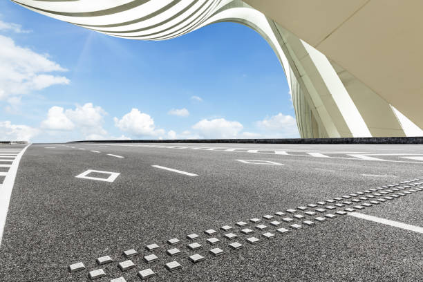 istock Asphalt road and modern building 657730364