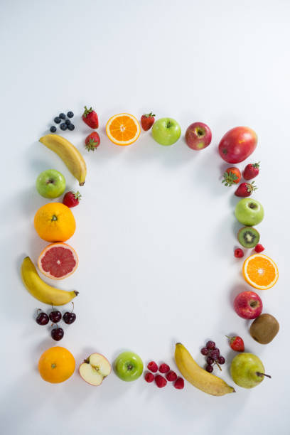 istock Various types of fruits arranged in square 657730814