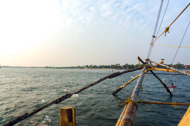 fishing net based on ancient technology and traditional materials, ropes and stones.
