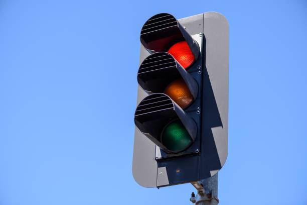 istock Red traffic lights in the blue sky background 657737192