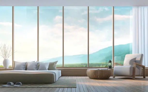 Modern bedroom with mountain view 3d rendering Image.Decorate wall with nature stone. There are large window overlooking the surrounding nature and mountains