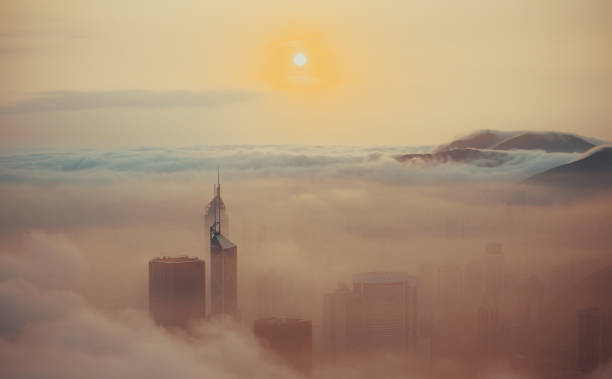 istock Clouds rolling over Hong Kong Victoria Harbor at misty season 657743972