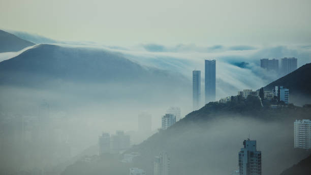 istock Clouds rolling over Hong Kong Victoria Harbor at misty season 657743974