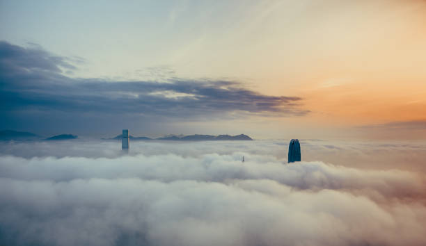 istock Clouds rolling over Hong Kong Victoria Harbor at misty season 657743990