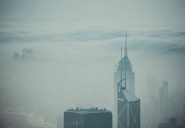 istock Clouds rolling over Hong Kong Victoria Harbor at misty season 657743992