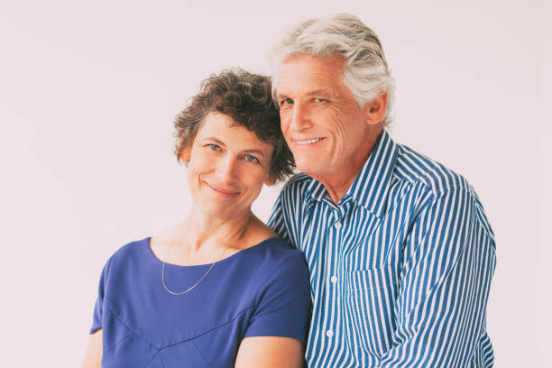 istock Happy Elderly Couple Embracing and Smiling 657747314