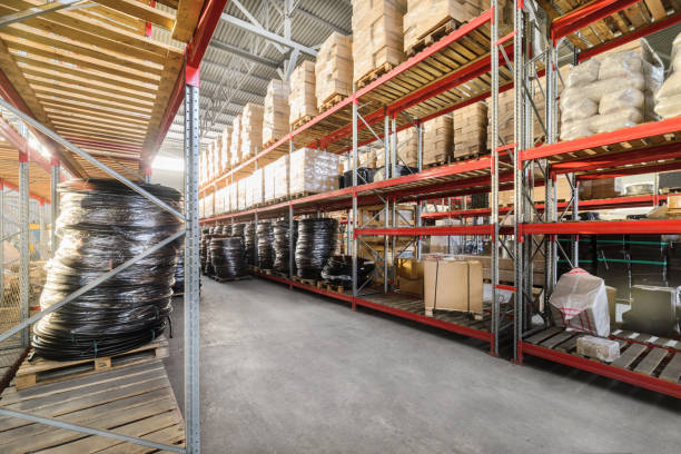 istock Long shelves with a variety of boxes and containers 657750342
