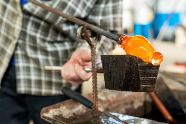 Handmade figures of melted glass Handmade figures of melted glass - selective focus hand blown glass stock pictures, royalty-free photos & images