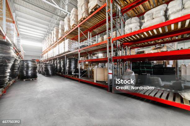 Long Shelves With A Variety Of Boxes And Container Stock Photo - Download Image Now - Warehouse, Store, Plumber