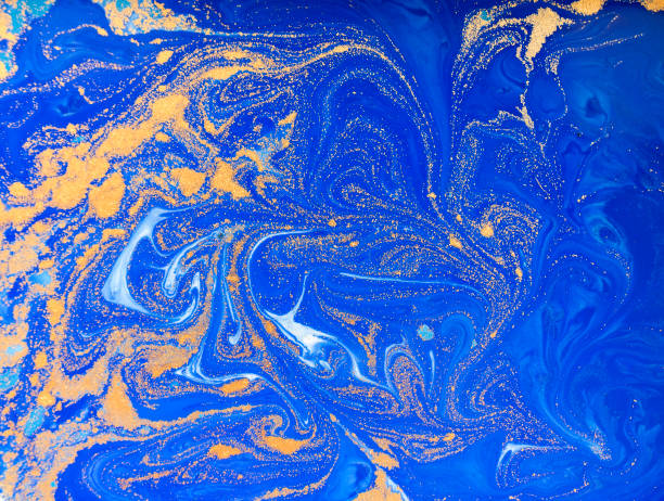 istock Blue and golden liquid texture, watercolor hand drawn marbling illustration, abstract background 657750568