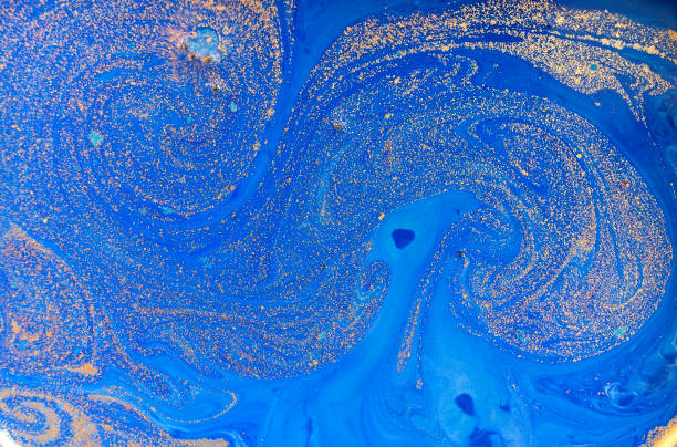istock Blue and golden liquid texture, watercolor hand drawn marbling illustration, abstract background 657750672