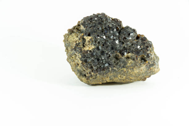 istock Beautiful semiprecious stone Garnet on a white background 657751546