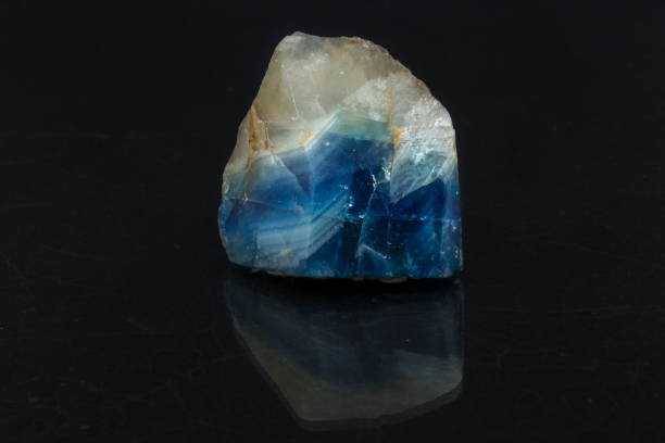 istock Beautiful semi-precious stone Larimar on a black background 657751854