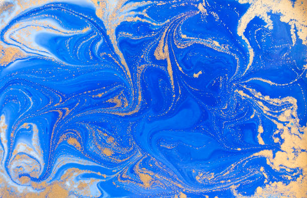 istock Blue and golden liquid texture, watercolor hand drawn marbling illustration, abstract background 657754192