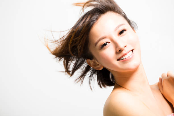 istock happy young Woman with hair motion 657756836