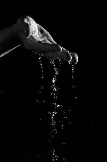 istock A man's hand and clean water. 657757544