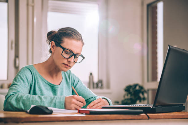 istock Woman working at home office 657757832