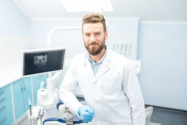 istock Portrait of handsome dentist 657761204