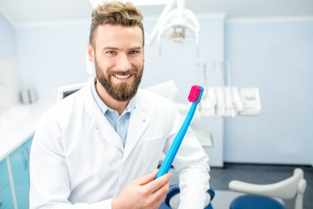 istock Portrait of funny dentist 657761514