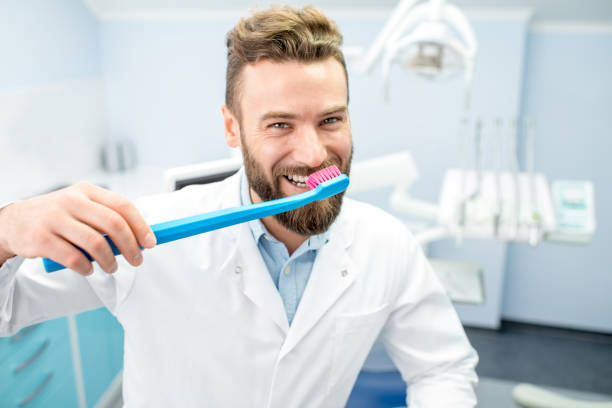 istock Portrait of funny dentist 657761564