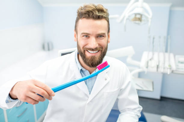 istock Portrait of funny dentist 657761612