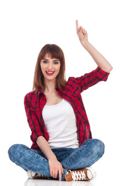 istock Woman Pointing Up And Talking 657765406