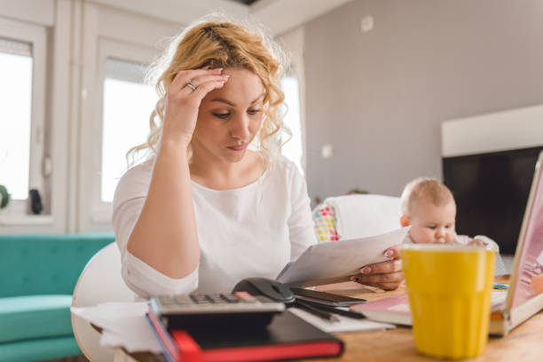 istock Worried mother looking at leathers 657766172