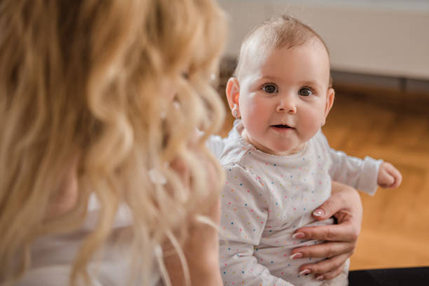 istock Baby in mother's arms 657772096