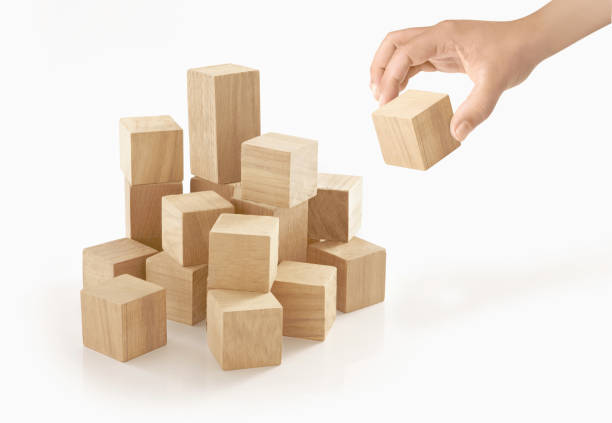 istock Single hand playing wooden box on isolated background. 657779312