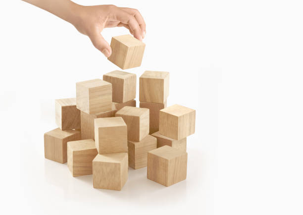 istock Single hand playing wooden box on isolated background. 657779350
