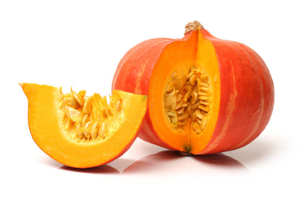 istock Fresh orange pumpkin with seeds isolated on white background 657780212