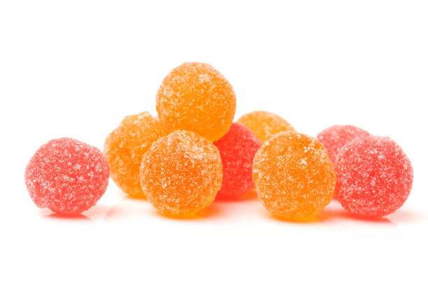 fruit jelly colored balls on a white background fruit jelly colored balls on a white background candy jellybean variation color image stock pictures, royalty-free photos & images